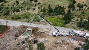 Spillway drainage expansion concrete pour under sr-14