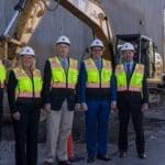 Utah House Speaker Greg Hughes, R-Draper, under the guidance of Brett Gines operates an Sunroc track hoe